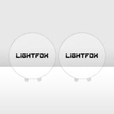 Two round driving light covers with Lightfox branding on a white background